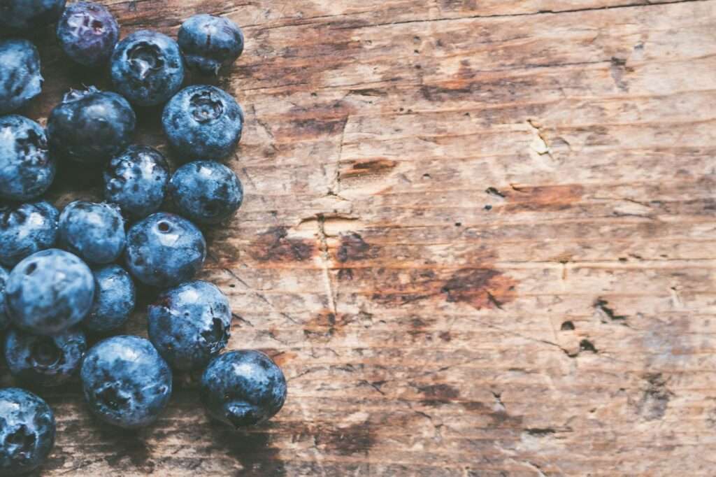 flat lay photography of blueberries