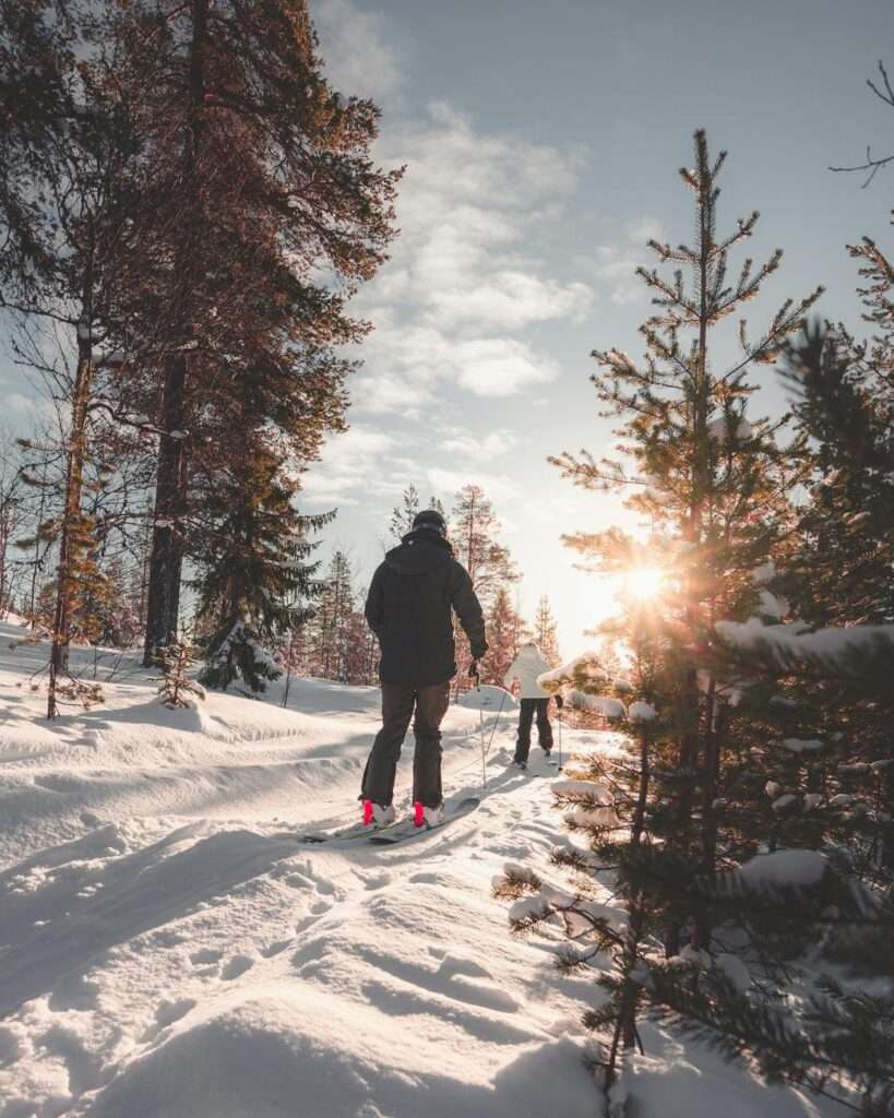 two people on a snow trail